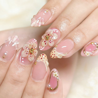 Nail set with floral design and elegant accents Acalora