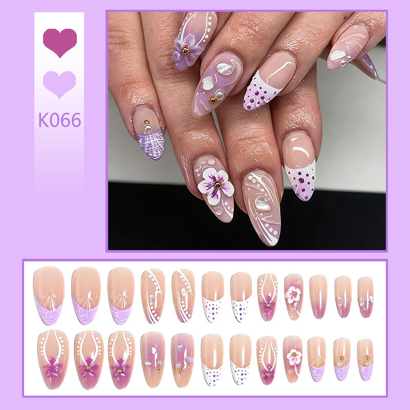 Artificial nail set with exotic floral and glitter accents Acalora
