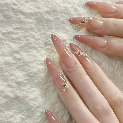 Glamorous artificial nail tips with elegant decorations Acalora