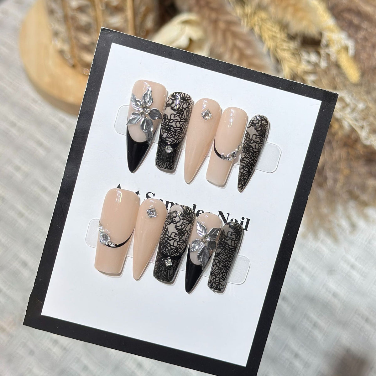 Artistic Stiletto Press-On Nail Set with Floral and Geometric Accents Acalora