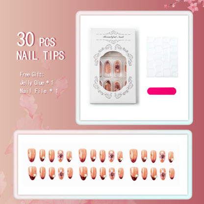 Artificial nail set with floral accents and gold embellishments Acalora