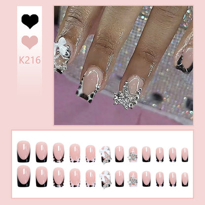 Acrylic nail set with glamorous starlights and elegant embellishments Acalora