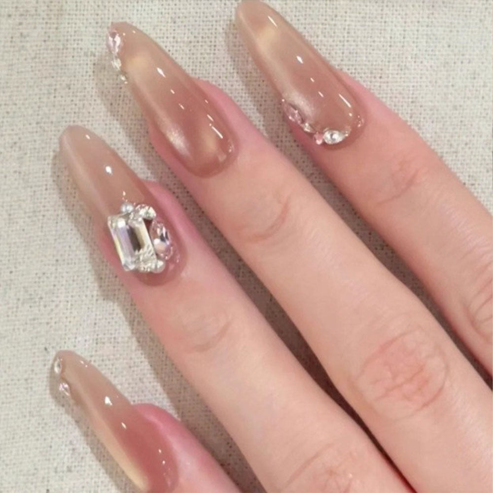 Luxury nude-style artificial nails with 3D stone decorations Acalora