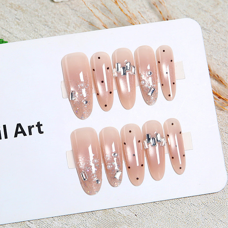 Artificial nail set with sparkling glitter and elegant jewelry details Acalora