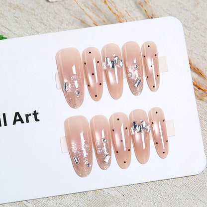 Artificial nail set with sparkling glitter and elegant jewelry details Acalora