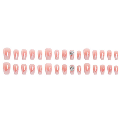 Artificial nail set with filigree tip designs and glamorous rhinestone accents Acalora