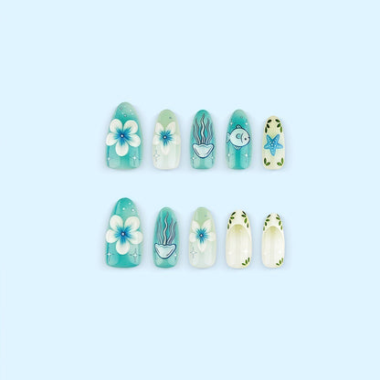 Artificial nails in a maritime design with colorful shell and water motifs Acalora