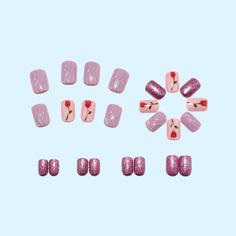 False nails with glamorous glitter design Acalora