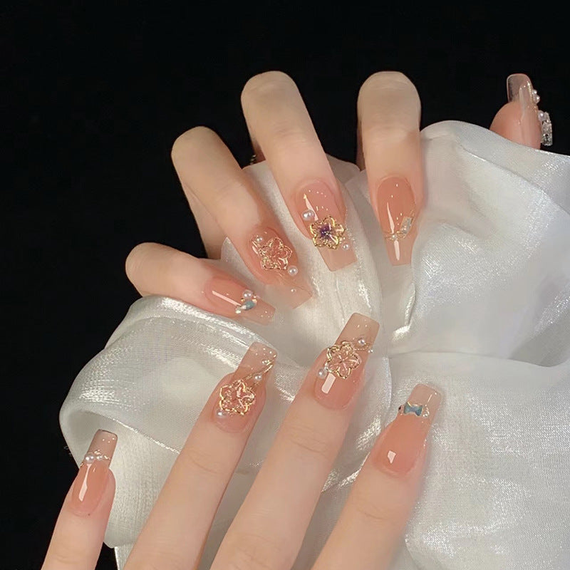 Artificial nail set with elegant floral and luxurious decorations Acalora
