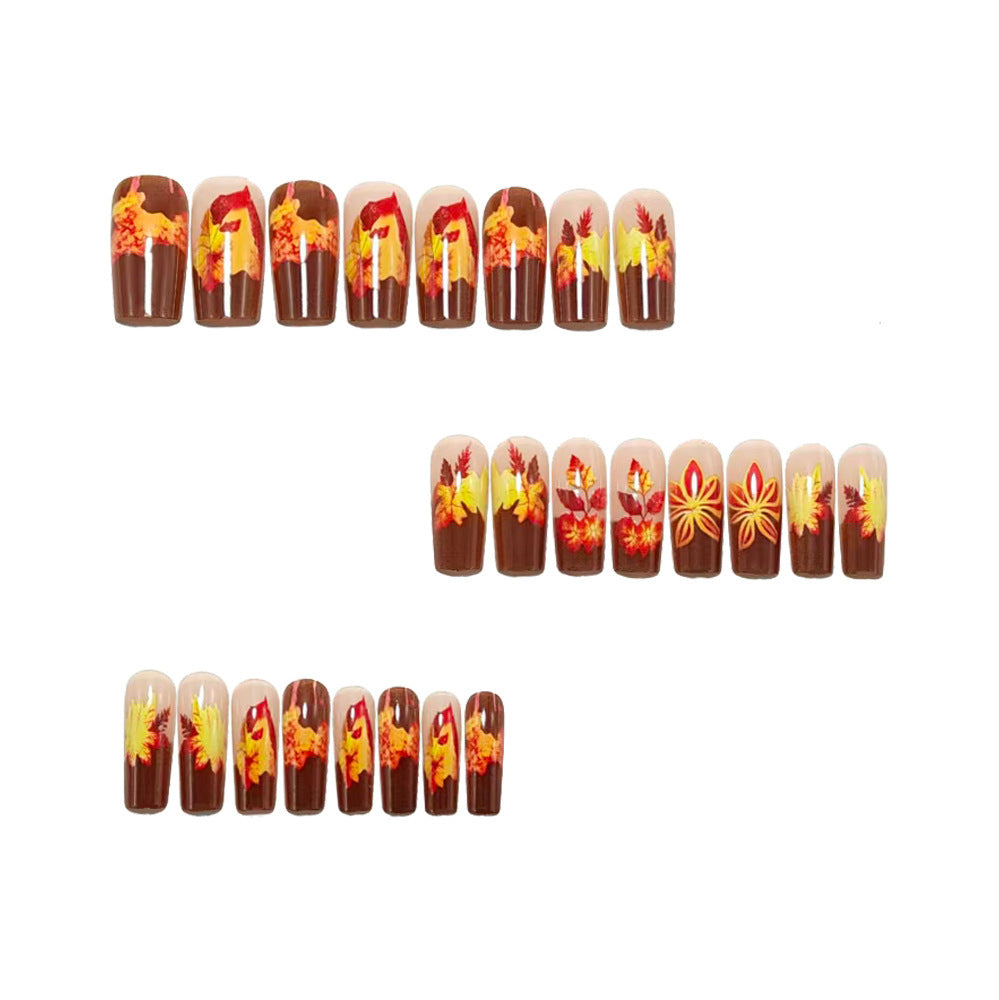 Artificial nails in elegant autumn design with leaf motifs Acalora