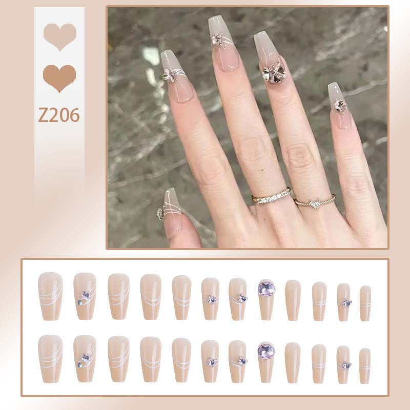 Art nail set with filigree decorations and glamorous accents Acalora