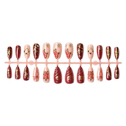 Artificial nail set in festive winter design with glamorous accents Acalora