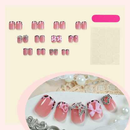 Decorative Press-On Nail Set with Artistic Bow and Heart Accents Acalora