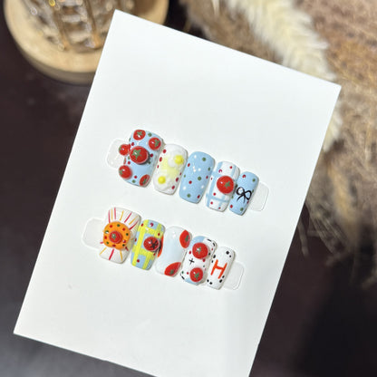 Artistic Press-On Nail Set with Playful Floral and Polka Dot Designs Acalora