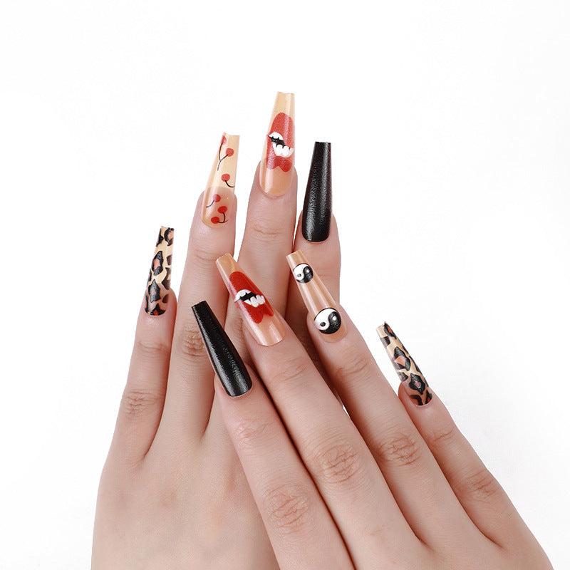 Artificial nails in creative designs with animal and face motifs Acalora