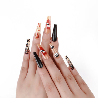 Artificial nails in creative designs with animal and face motifs Acalora