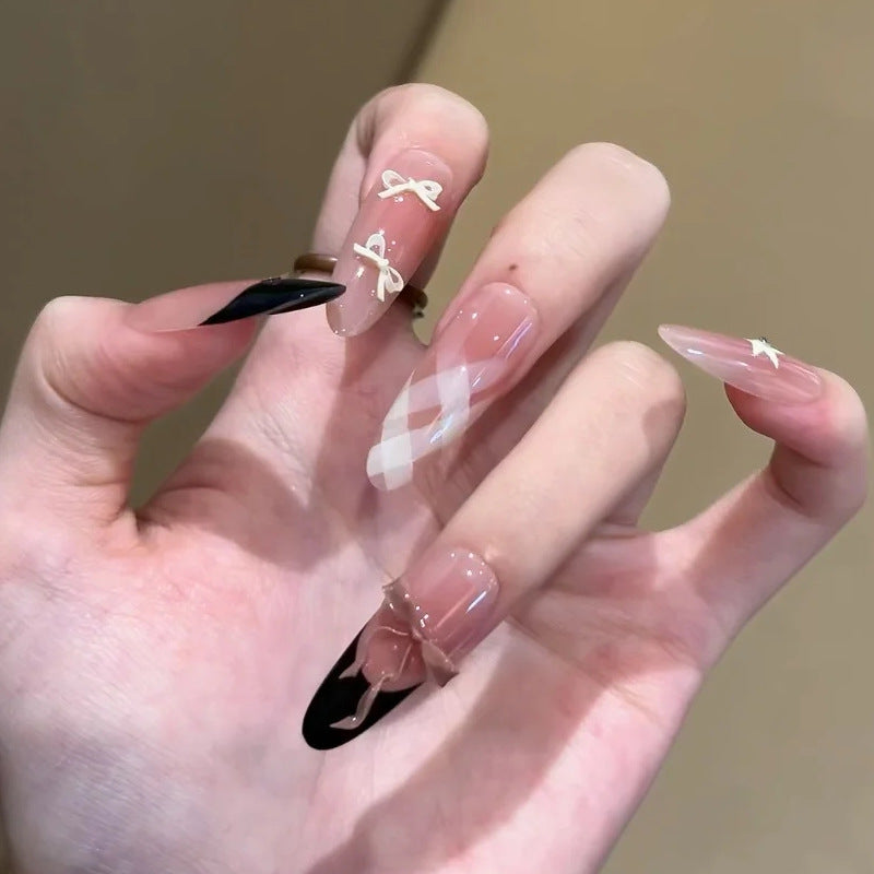 Glamorous artificial nails with creative embellishments Acalora