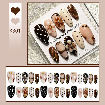 Art nail set with floral accents and elegant 3D decorations Acalora