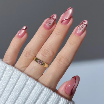 Nail art set with intricate bow and glitter decorations Acalora