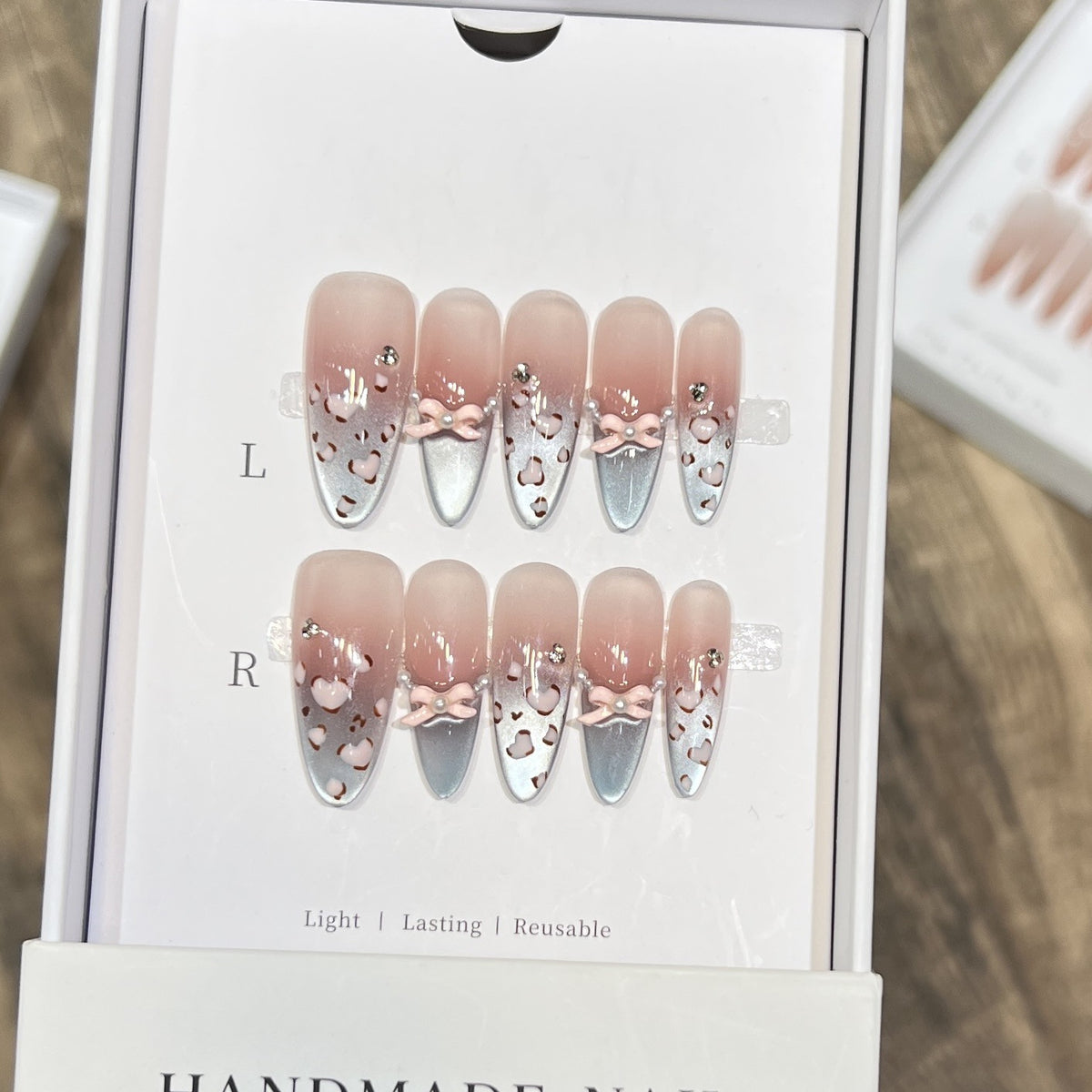 Decorative Press-On Nail Design with Bow Accents Acalora