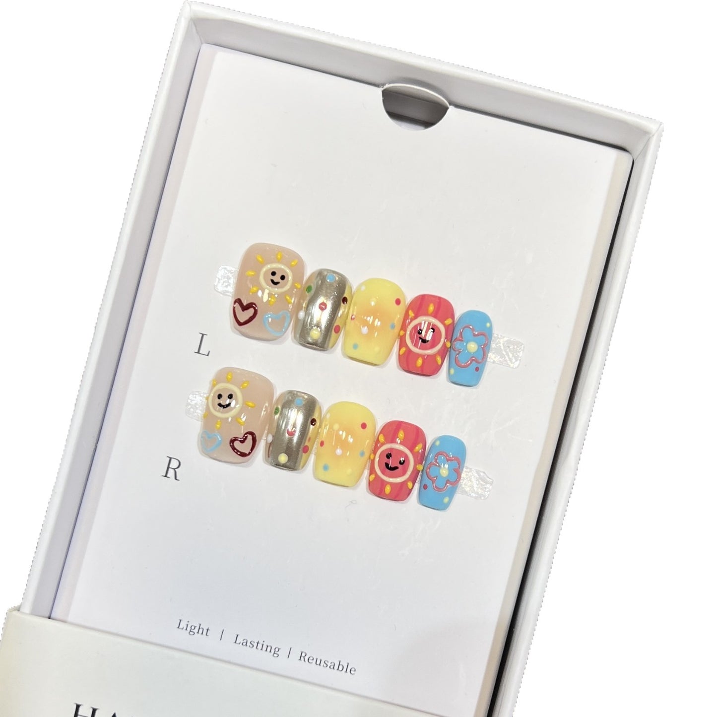 Whimsical Press-On Nail Art Set with Smiley Faces and Floral Designs Acalora