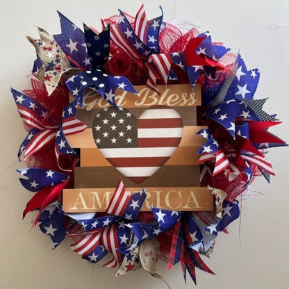 Unisex nan layered star wreath door decor with mixed ribbon bows and wooden accents Bowlift