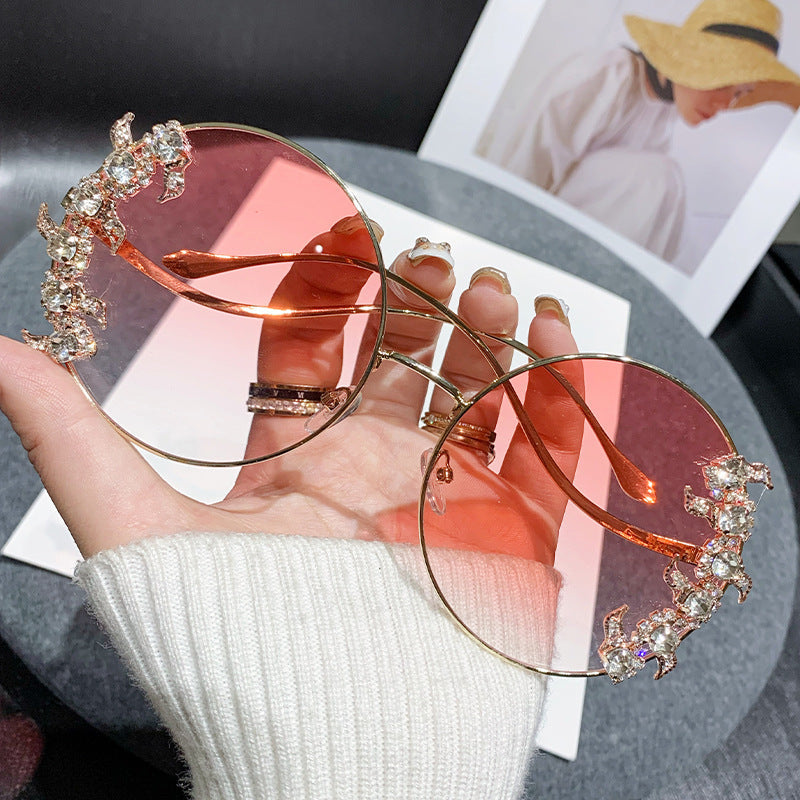 Women's fashion sunglasses with extravagant design and sparkling accents Bowlift