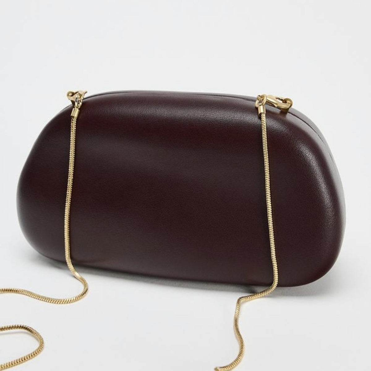 Statement Clutch with Sculptural Handle Acalora