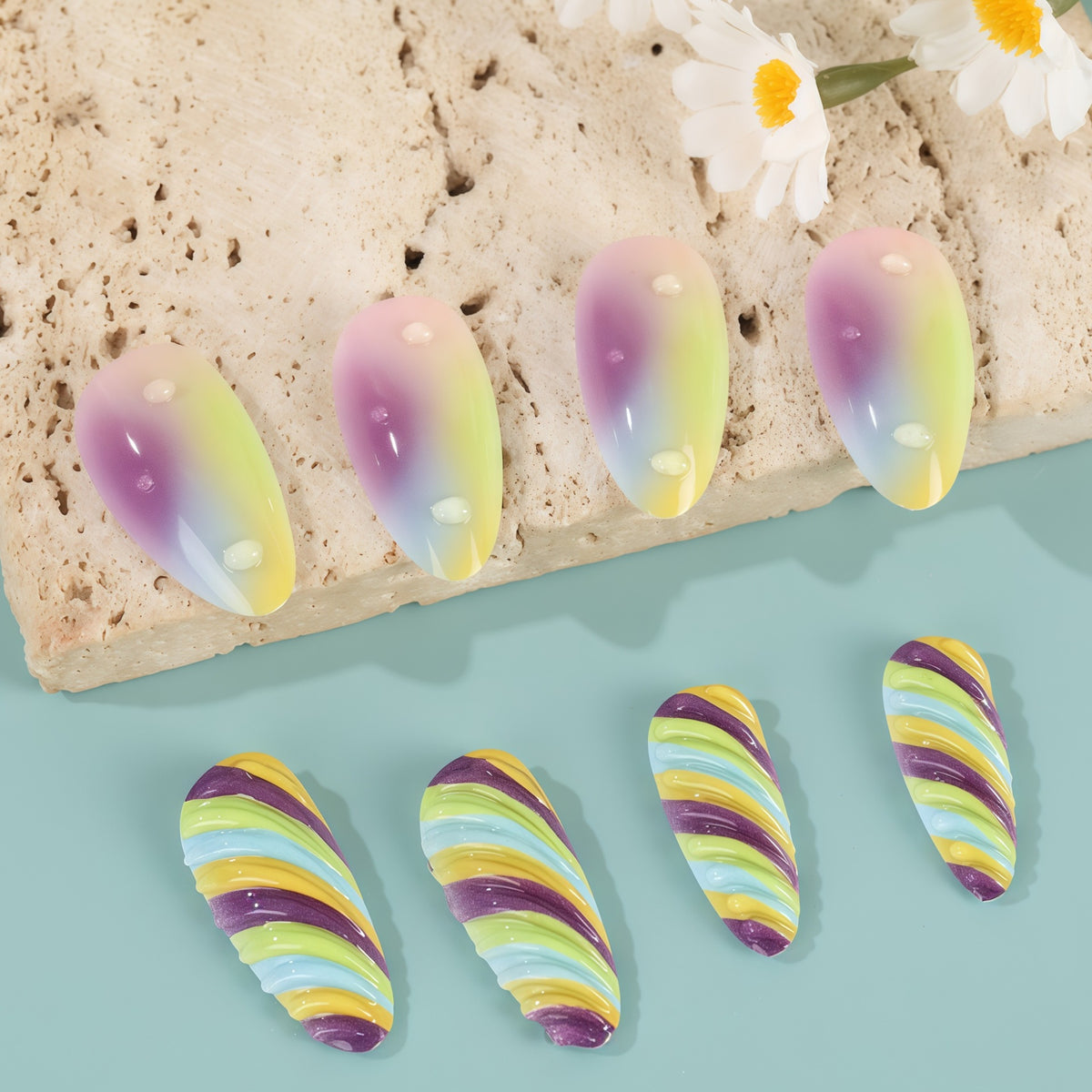 Artificial nails with soft ombre colors and creative patterns Acalora
