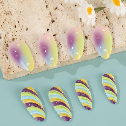 Artificial nails with soft ombre colors and creative patterns Acalora