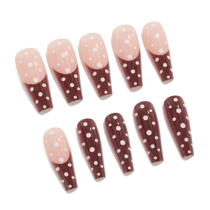 Artificial nails in the popular polka dot design Acalora
