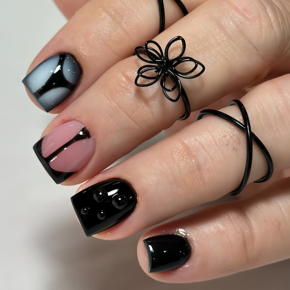 Artificial nails with elegant black and pastel accent design Acalora