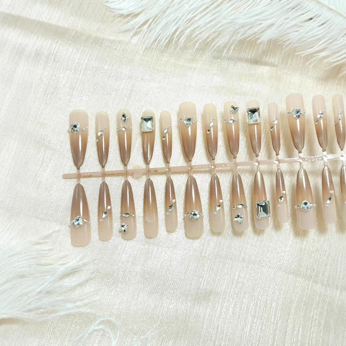 Acrylic nail set with glamorous 3D rhinestone applications Acalora