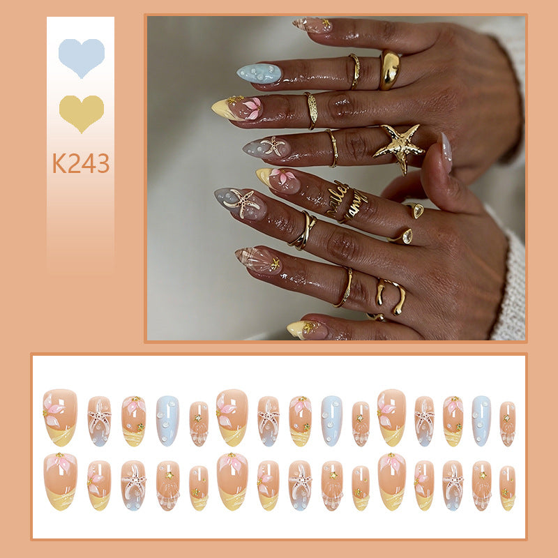 Artificial nail set with floral motifs and glitter accents Acalora