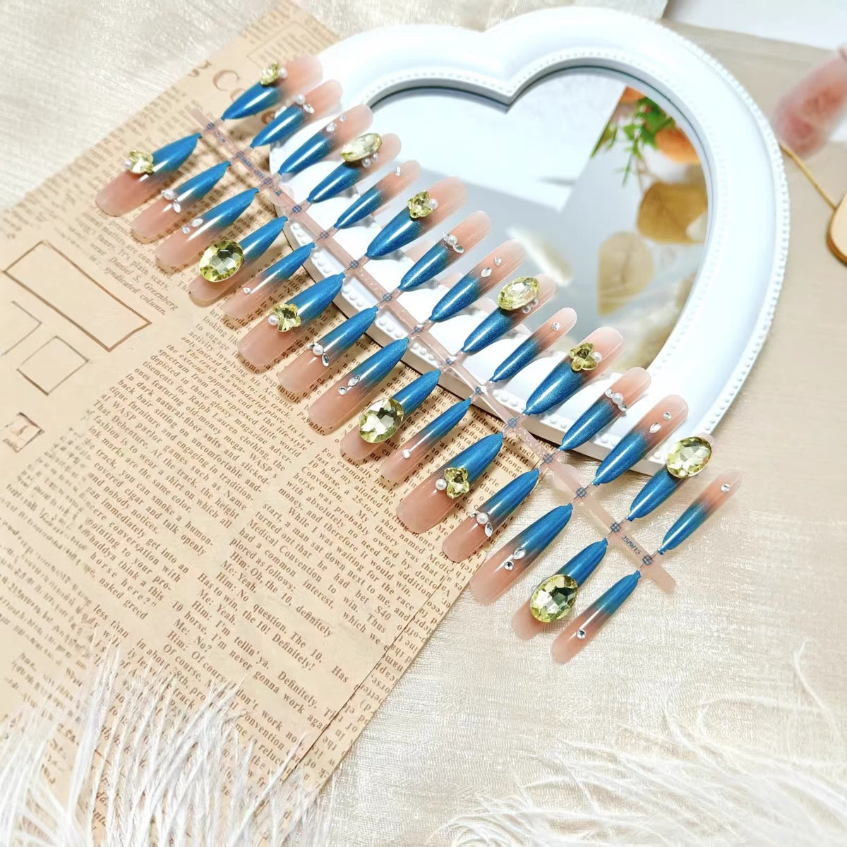 Artificial nails with glamorous stone applications Acalora