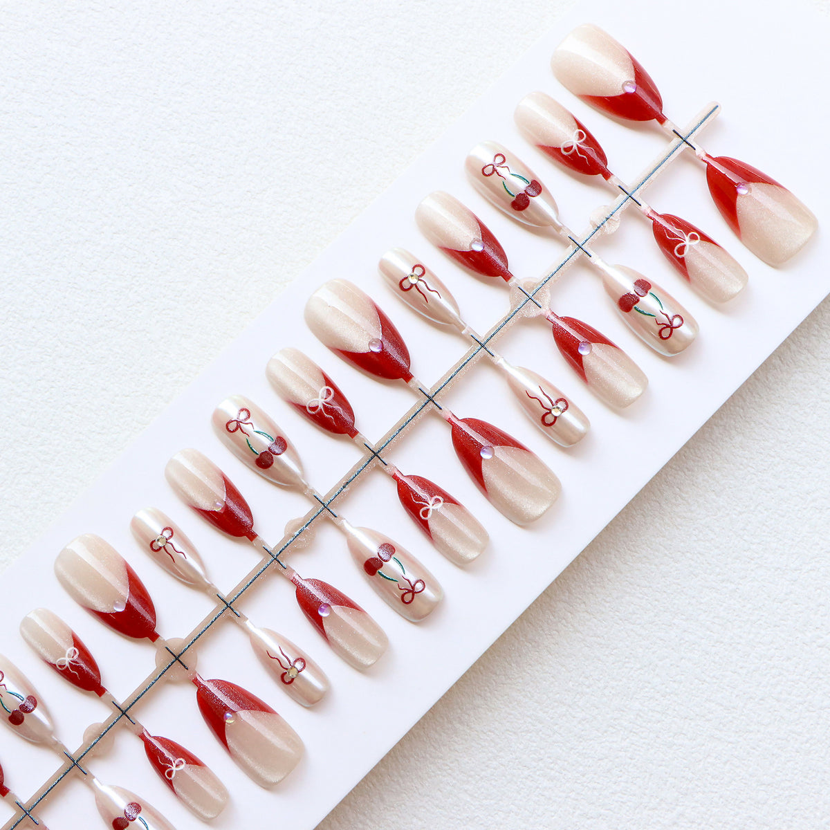 Artistic Press-On Nail Set with Cherry and Ribbon Design Acalora