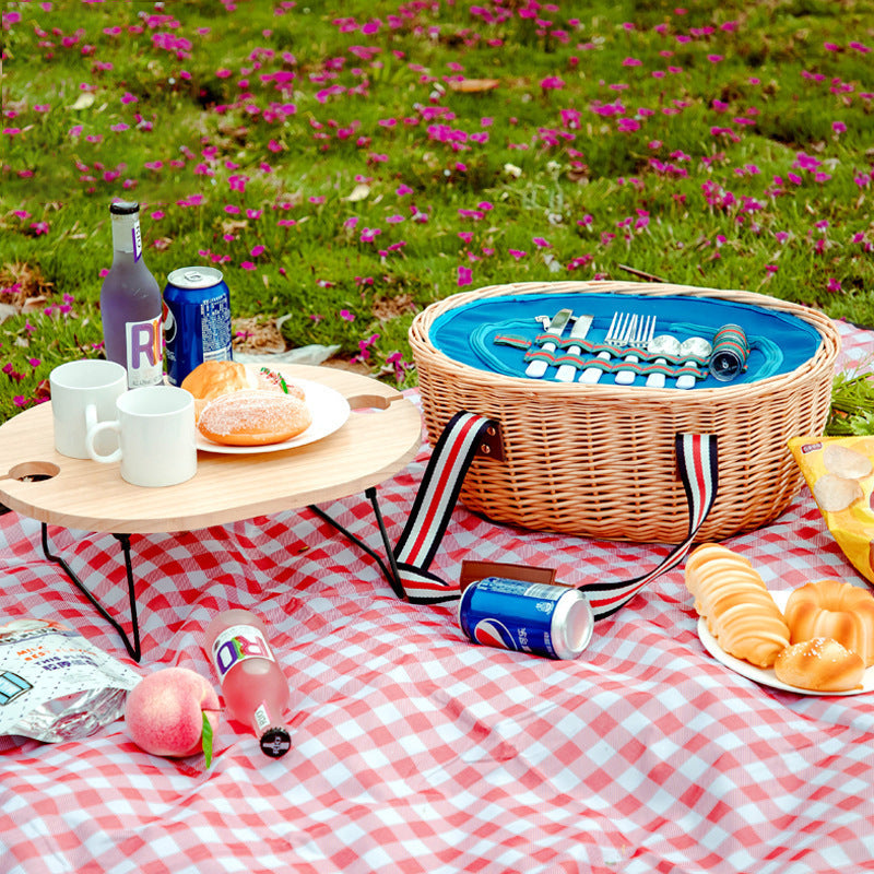 Exclusive basket with handles made of woven rattan Acalora