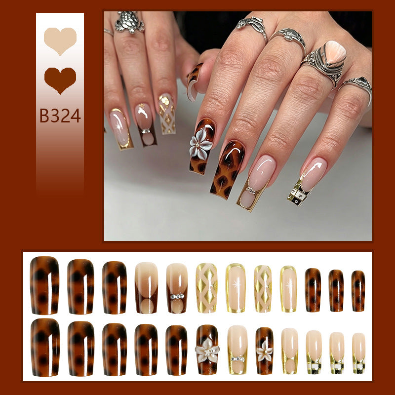 Acrylic nail set with glamorous decorations and elegant designs Acalora