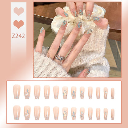 Glamorous artificial nail set with luxurious glitter elements Acalora