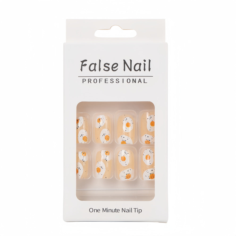 Artificial nails in creative fried egg design Acalora