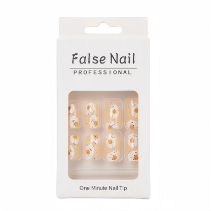 Artificial nails in creative fried egg design Acalora