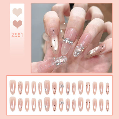 Artificial nail set with sparkling glitter and elegant jewelry details Acalora