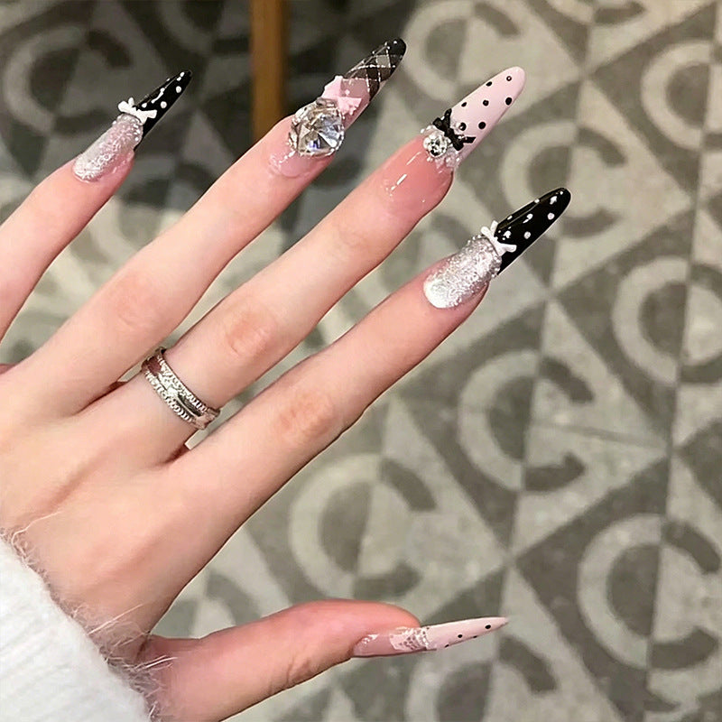 Artificial nail set with glamorous 3D applications and festive design Acalora