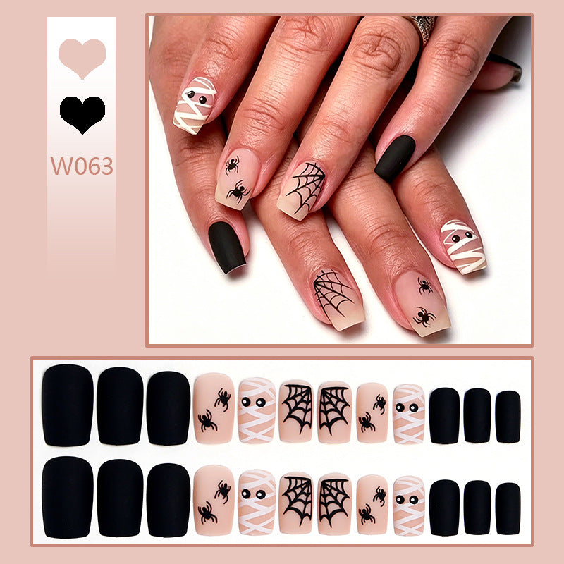 Artificial nail set with creepy Halloween motif and delicate spider designs Acalora