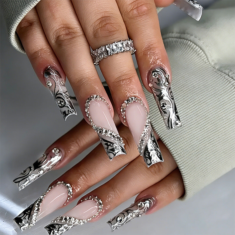 Acrylic nail set with elegant patterns and sparkling accents Acalora