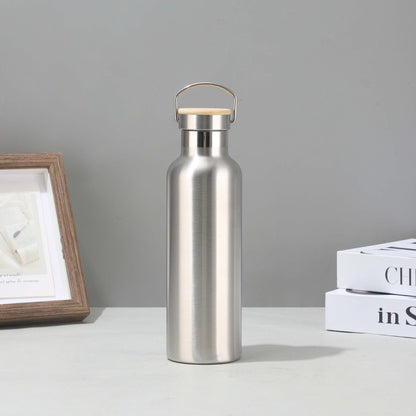 Women's stainless steel insulated drinking bottle with sustainable bamboo lid Kalsten