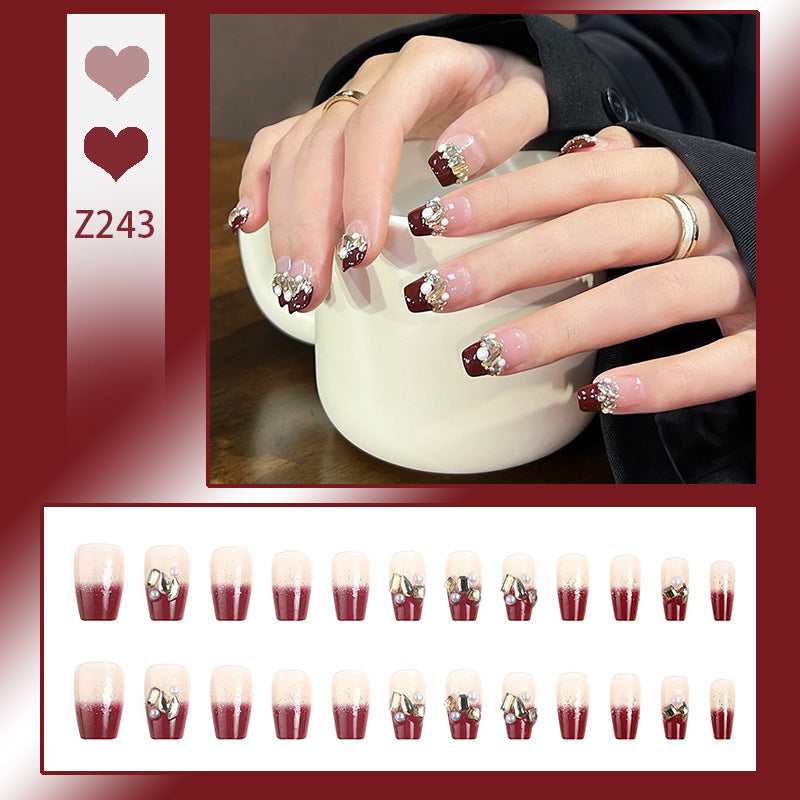 Acrylic nail set with elegant glitter and flower accents Acalora
