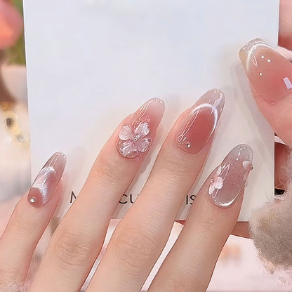 Artificial nail set with festive gift design and elegant glitter accents Acalora