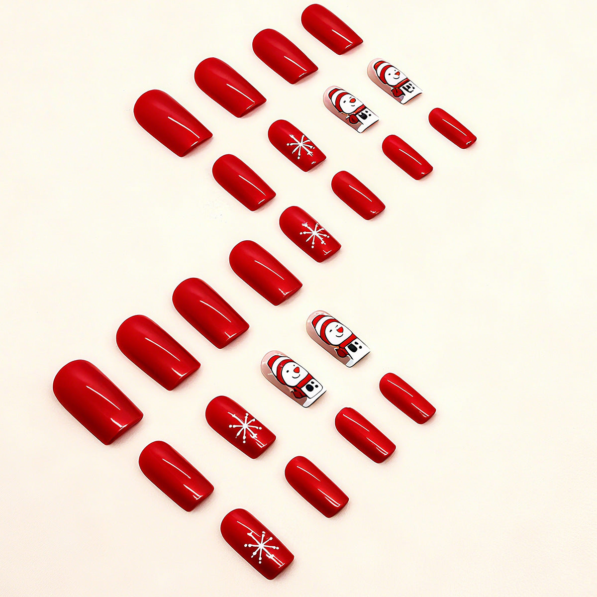 Artificial nail set with festive snowman design and glitter accents Acalora