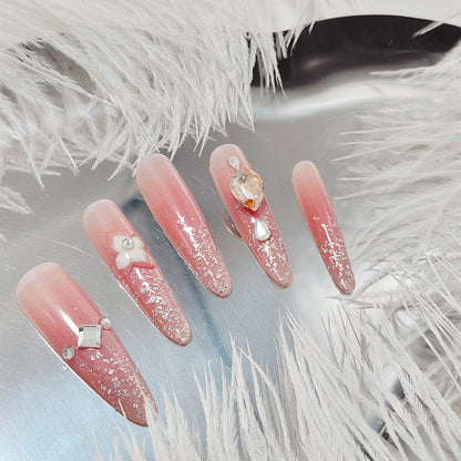 Artificial nail set with glitter and flower accents Acalora